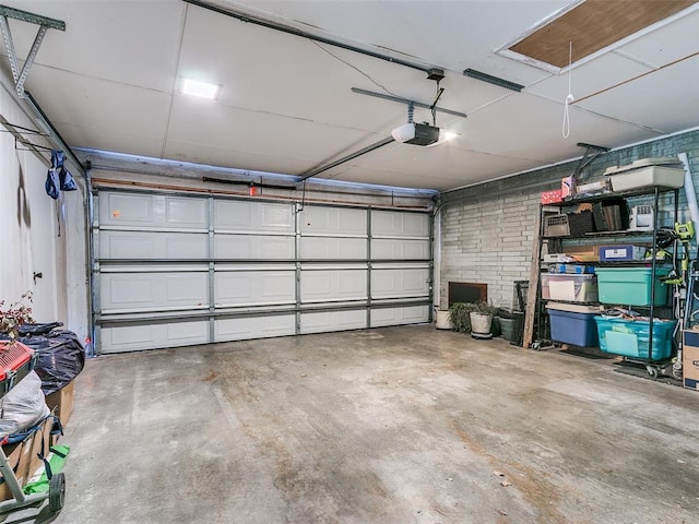 garage featuring a garage door opener