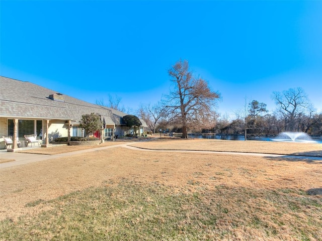 view of yard featuring a water view