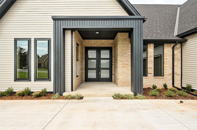 entrance to property featuring french doors