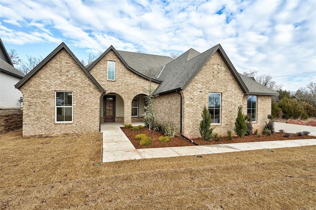 view of front of home with a front yard