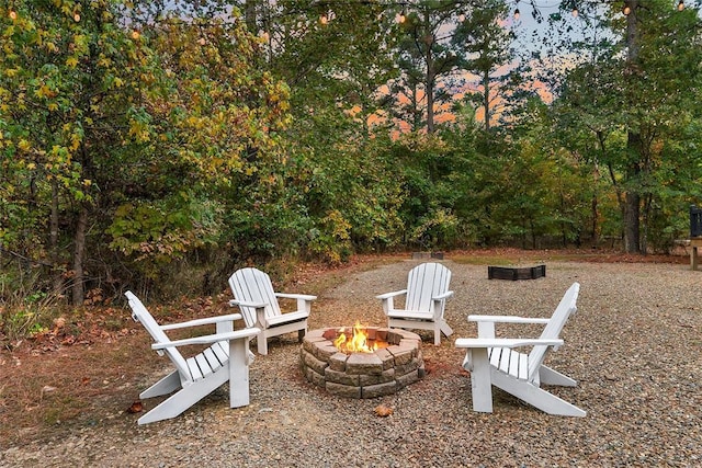 view of patio / terrace featuring a fire pit