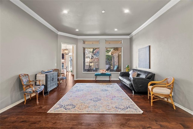 sitting room featuring crown molding and dark hardwood / wood-style floors