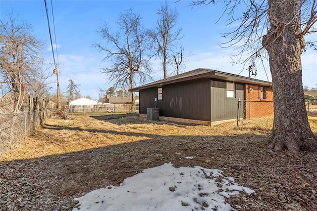 view of home's exterior with cooling unit