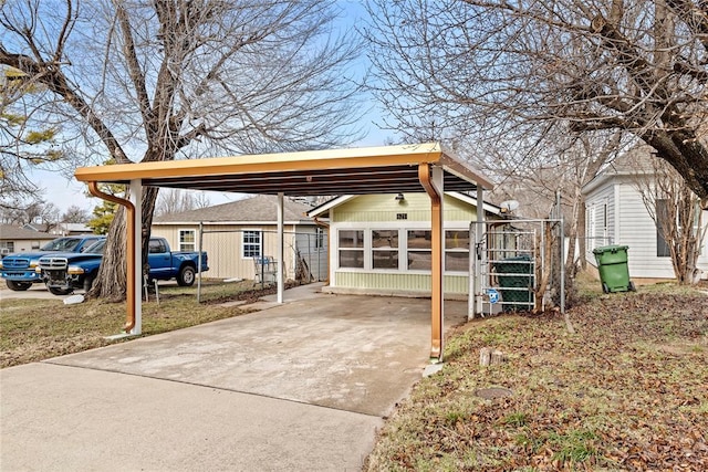 exterior space with a carport