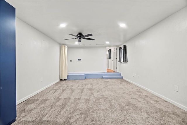 interior space featuring carpet flooring and ceiling fan