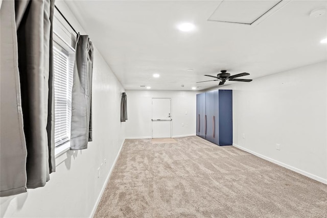 interior space featuring light colored carpet