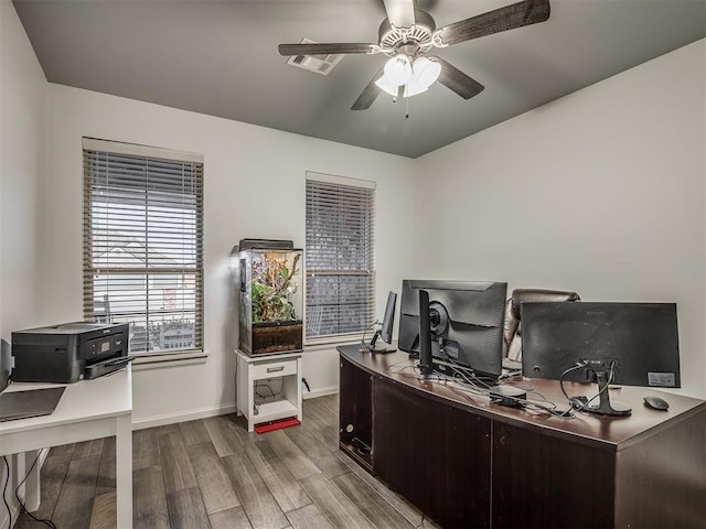 office area with ceiling fan and light hardwood / wood-style flooring