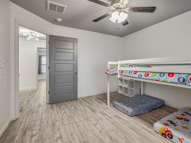 bedroom featuring ceiling fan and light hardwood / wood-style flooring