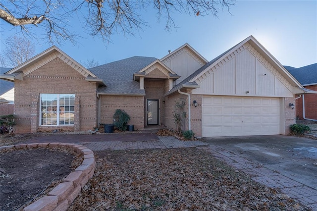 view of front of property with a garage