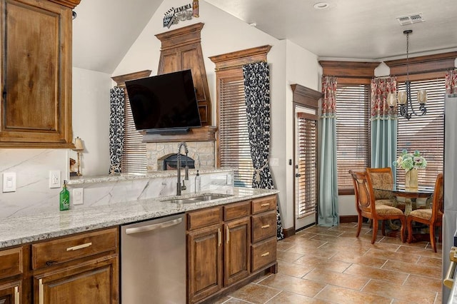 kitchen with brown cabinetry, visible vents, dishwasher, and decorative backsplash