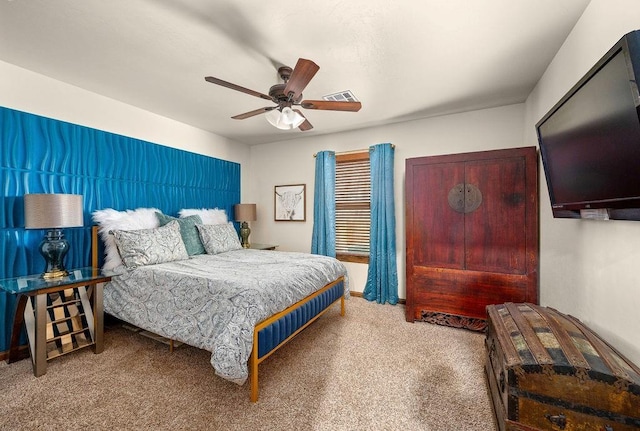 bedroom with visible vents, ceiling fan, and carpet flooring