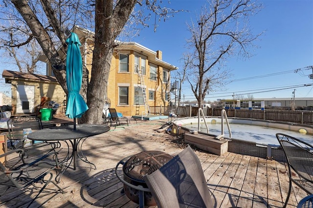 view of patio / terrace featuring a wooden deck