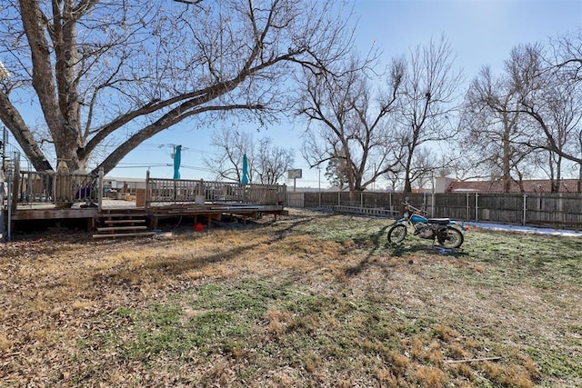 view of yard with a wooden deck