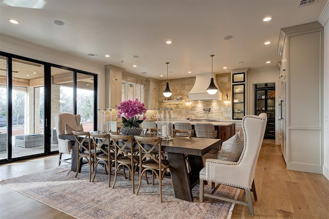 dining room with light wood-type flooring