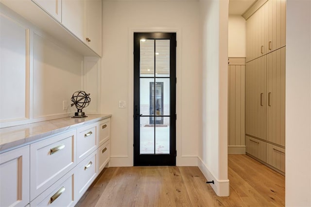 doorway featuring light hardwood / wood-style floors