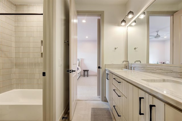 bathroom featuring ceiling fan, shower / bath combination, tile patterned floors, and vanity