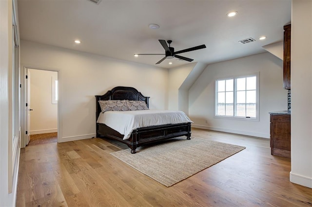 bedroom featuring ceiling fan and light hardwood / wood-style floors