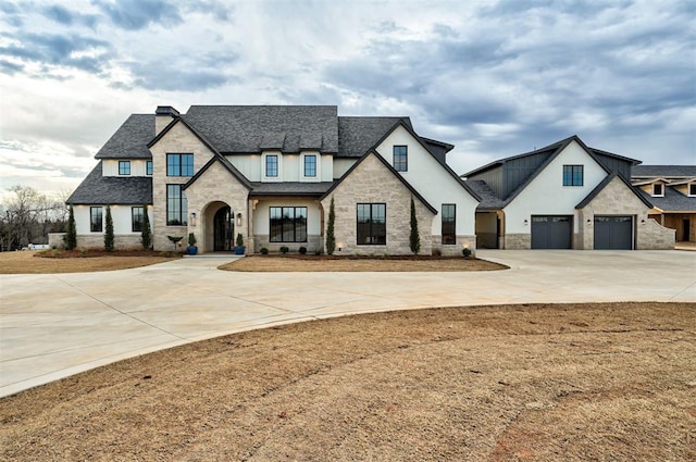 view of front of property with a garage