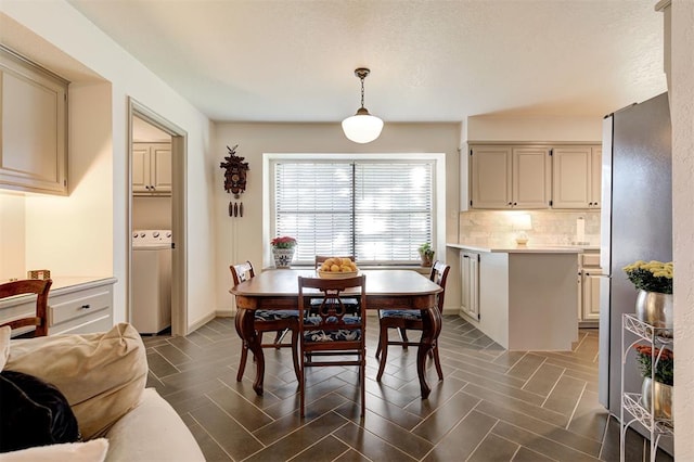 dining room with washer / dryer