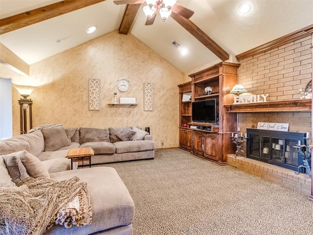 carpeted living room with a fireplace, ceiling fan, and vaulted ceiling with beams