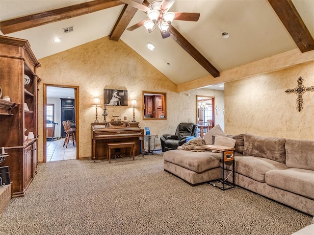 living room featuring a wealth of natural light, carpet flooring, beam ceiling, and high vaulted ceiling