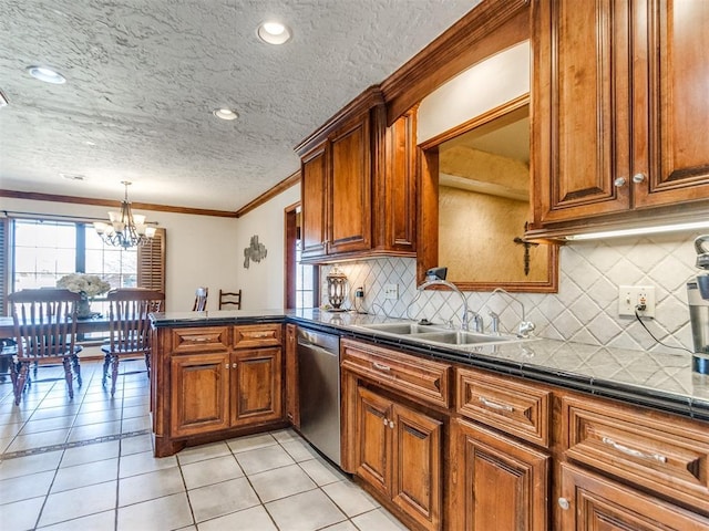 kitchen with kitchen peninsula, stainless steel dishwasher, hanging light fixtures, sink, and light tile patterned floors