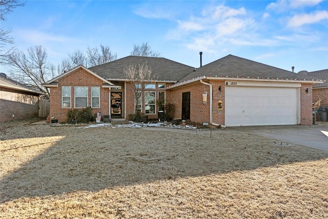 ranch-style home with a garage