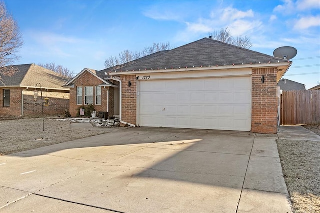 single story home with a garage