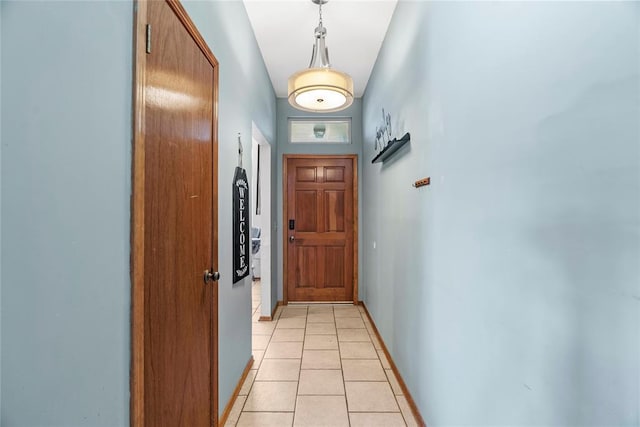 doorway featuring light tile patterned floors