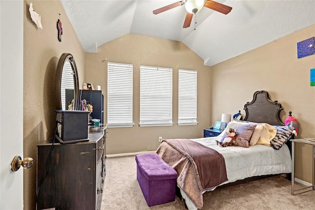 bedroom featuring lofted ceiling, light carpet, and ceiling fan