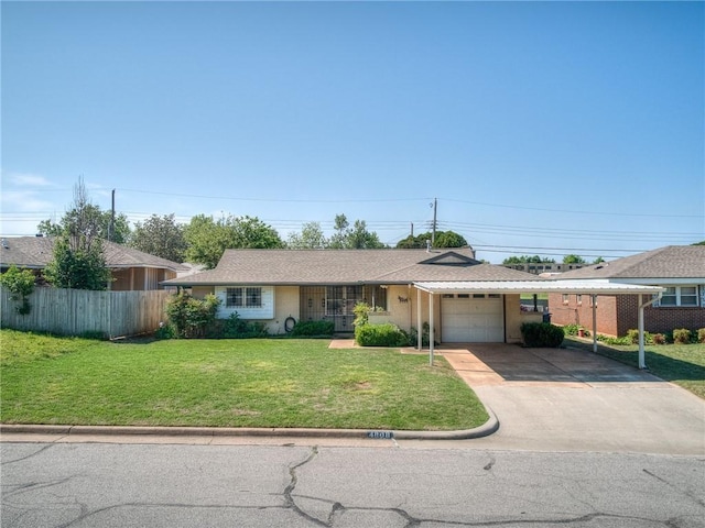 ranch-style house with a garage and a front yard