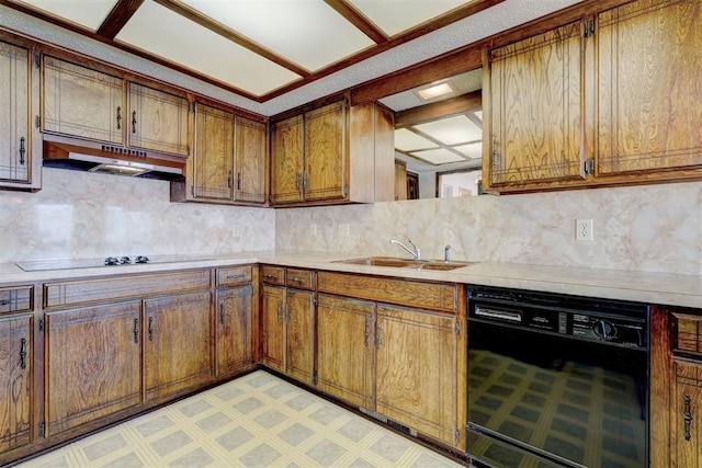 kitchen with tasteful backsplash, sink, and black appliances