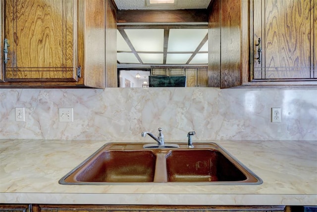 kitchen with sink and backsplash