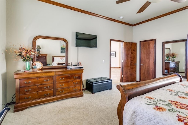 bedroom featuring ceiling fan, light carpet, and ornamental molding