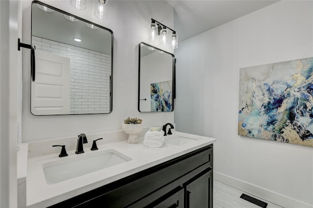 bathroom featuring vanity and tile patterned flooring