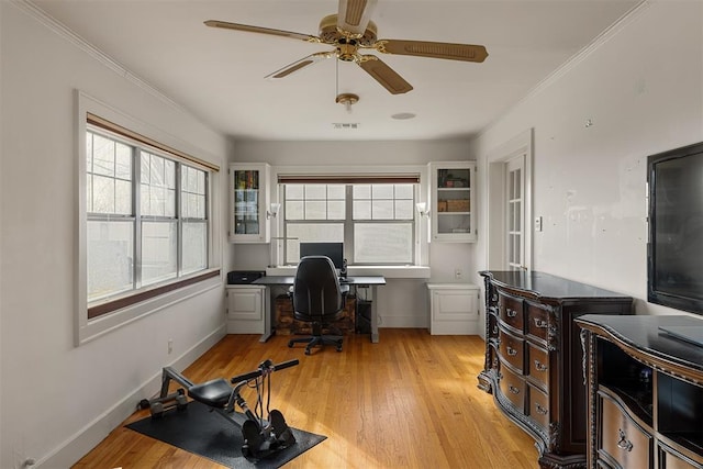 home office with ceiling fan and light hardwood / wood-style flooring