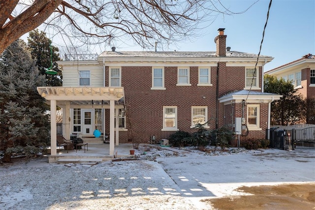 view of front of home with a pergola