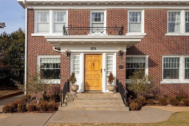 property entrance with a balcony