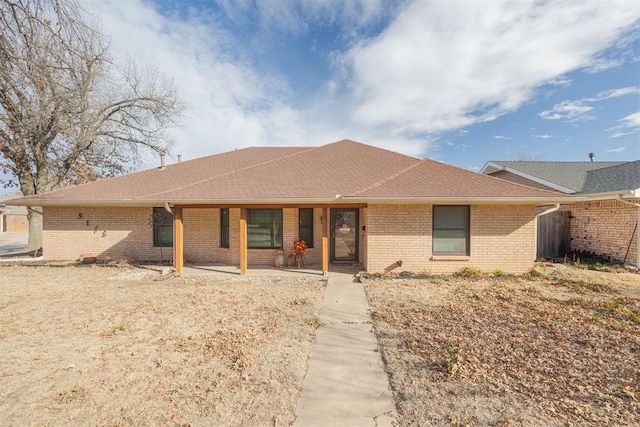 ranch-style house with a patio area