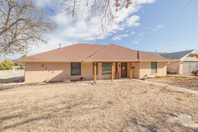 back of property with a patio area