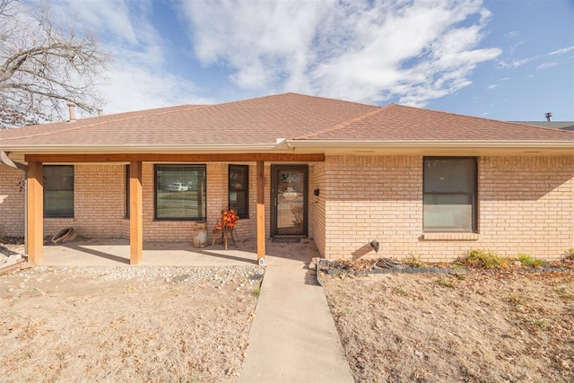 ranch-style house featuring a patio area