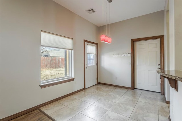 interior space featuring light tile patterned floors