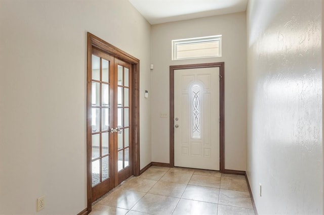 tiled foyer with french doors