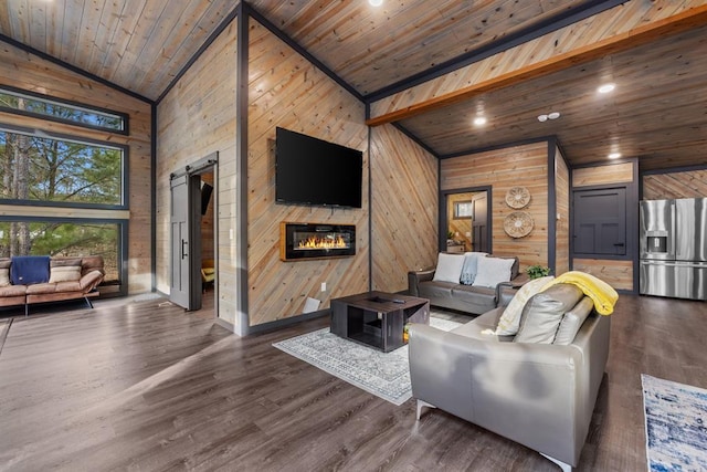 living room featuring a fireplace, a barn door, wood ceiling, and dark hardwood / wood-style floors