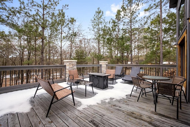 deck featuring a fire pit