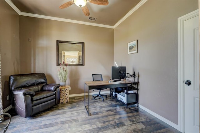 office space featuring baseboards, wood finished floors, visible vents, and ornamental molding