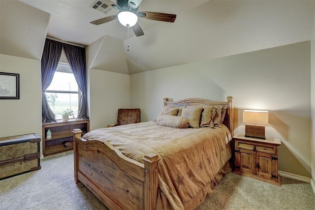 bedroom featuring a ceiling fan, visible vents, baseboards, lofted ceiling, and light colored carpet