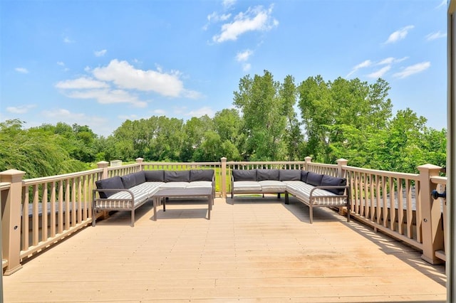 wooden deck featuring outdoor lounge area