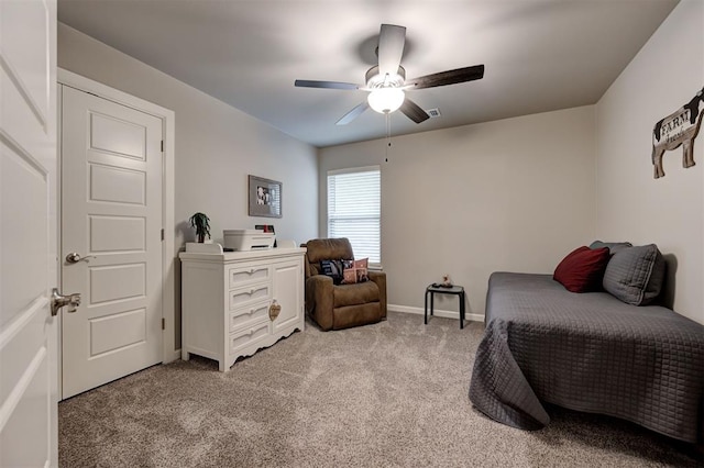 carpeted bedroom featuring ceiling fan