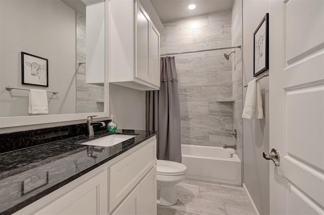 full bathroom with vanity, toilet, and shower / bath combo with shower curtain